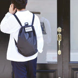 Post General Drawstring Bag - Black | Post General 環保摺疊束口防潑水雙肩背囊